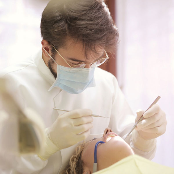 Patient undergoing orthodontic braces procedure